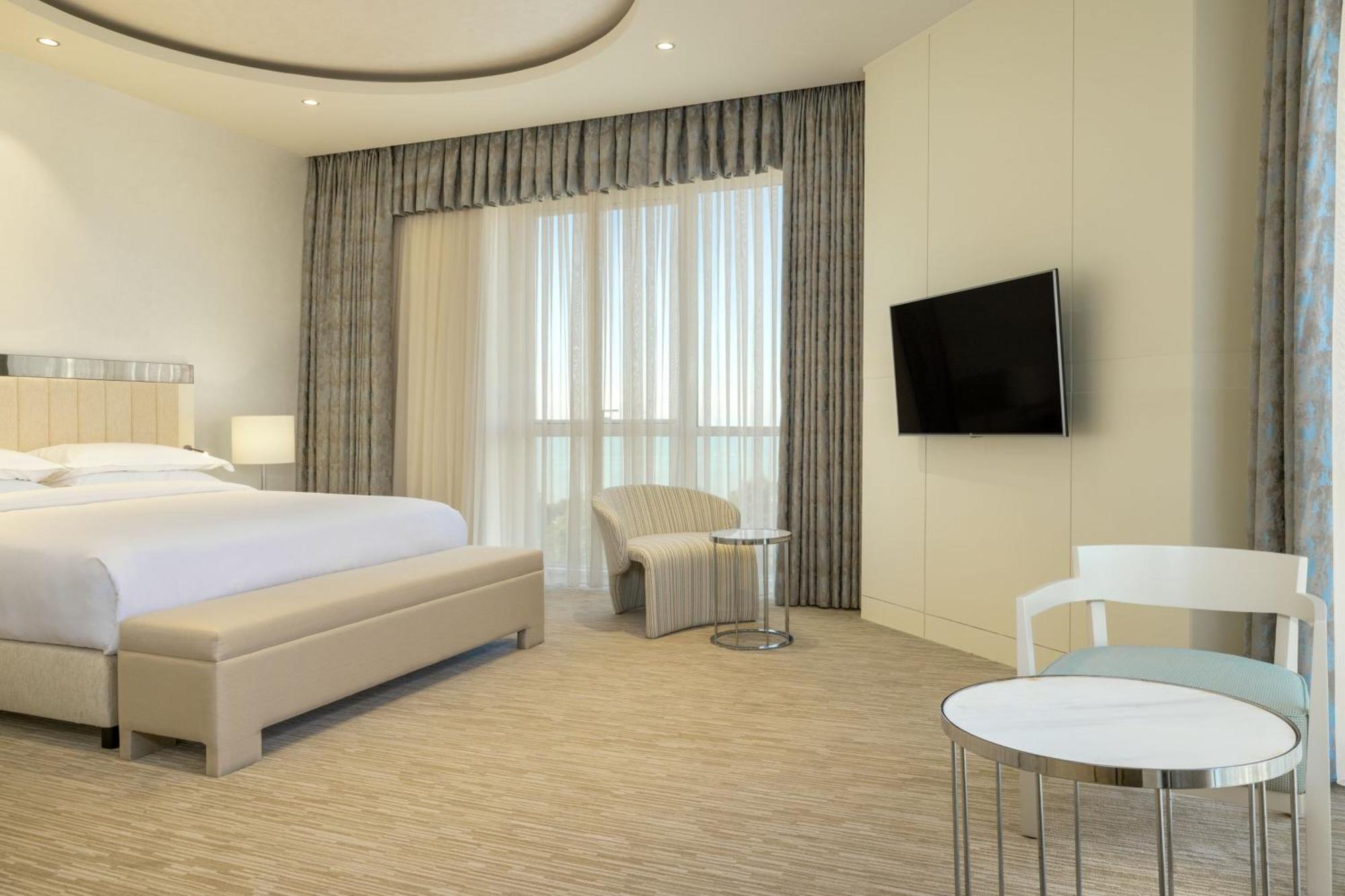 Sheraton Batumi Hotel Kültér fotó A bedroom at the hotel