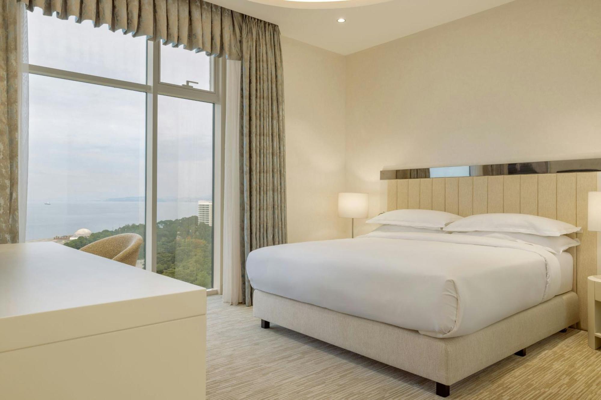 Sheraton Batumi Hotel Kültér fotó A bedroom at the hotel